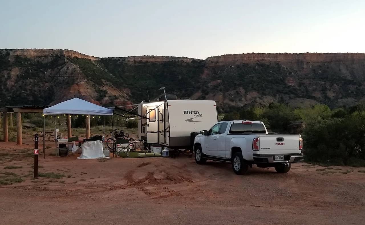 Truck and camper in Palo Duro Canyon State Park Campground