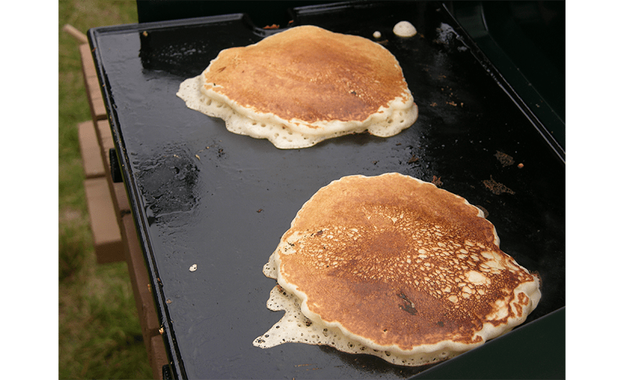 https://www.cruiseamerica.com/getattachment/rv-adventures/RV-Lifestyle/Campground-Cooking-Made-Easy-With-Pre-made-Meals/RV-rental_premade-camping-meals_pancakes-(1).png